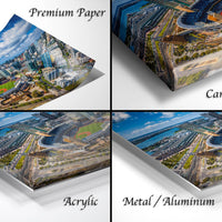 The image is a collage of four different views of a city, each showing a different perspective of the urban landscape. The collage includes a close-up view of the city's skyline, a panoramic view of the city's layout, a detailed view of the city's streets and buildings, and a close-up view of the city's green spaces, such as parks and gardens.