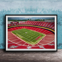 The image is a framed photograph of a football stadium, specifically Kansas City Chiefs Stadium, with a view of the field and seating areas.