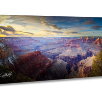 a breathtaking view of the Grand Canyon, with its vast, rugged landscape stretching out beneath a dramatic sky filled with clouds and vibrant colors.