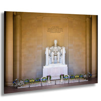 This fine art photograph captures the Lincoln Memorial in Washington DC during the quiet beauty of sunrise. The iconic marble statue of Abraham Lincoln sits beneath the powerful inscription honoring the president who preserved the Union. With soft morning light illuminating the historic monument and ceremonial wreaths placed along the base, this image celebrates one of America’s most meaningful landmarks. Perfect for collectors of Washington DC photography, presidential history artwork