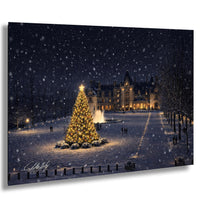 A large, brightly lit Christmas tree stands in the foreground, surrounded by snow, with a grand, illuminated building in the background.