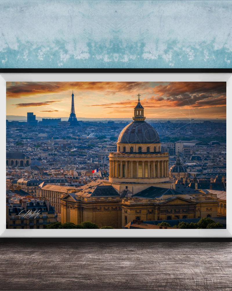 a cityscape with a large domed building in the foreground, surrounded by other buildings and a skyline in the background, with the Eiffel Tower visible in the distance.