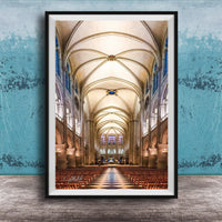 a grand cathedral with a high vaulted ceiling, ornate architectural details, and rows of wooden pews leading to the altar.