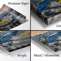 four different views of a printed artwork depicting a cityscape, with the artwork labeled as "Premium Paper", "Canvas Wrap", "Acrylic", and "Metal/Aluminum".