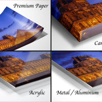 The image is a collage of four photos depicting the Louvre Museum in Paris, France, with three of the photos appearing to be printed on canvas wraps and the fourth photo being an acrylic print.