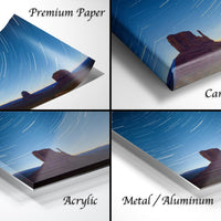 The image is a collage of four different images, each depicting a landscape with a mountain or hill under a starry sky. The images are labeled as "Premium Paper", "Canvas Wrap", "Acrylic", and "Metal/Aluminum".