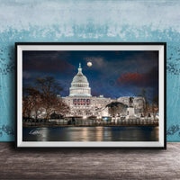 the United States Capitol building at night, with the moon visible in the sky.