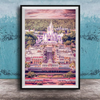 A framed image depicting a fantastical castle-like structure surrounded by a colorful, whimsical landscape, with a cloudy sky in the background.