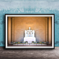 This fine art photograph captures the Lincoln Memorial in Washington DC during the quiet beauty of sunrise. The iconic marble statue of Abraham Lincoln sits beneath the powerful inscription honoring the president who preserved the Union. With soft morning light illuminating the historic monument and ceremonial wreaths placed along the base, this image celebrates one of America’s most meaningful landmarks. Perfect for collectors of Washington DC photography, presidential history artwork