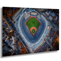 An aerial view of a baseball stadium with a green field and red lines marking the seating areas.