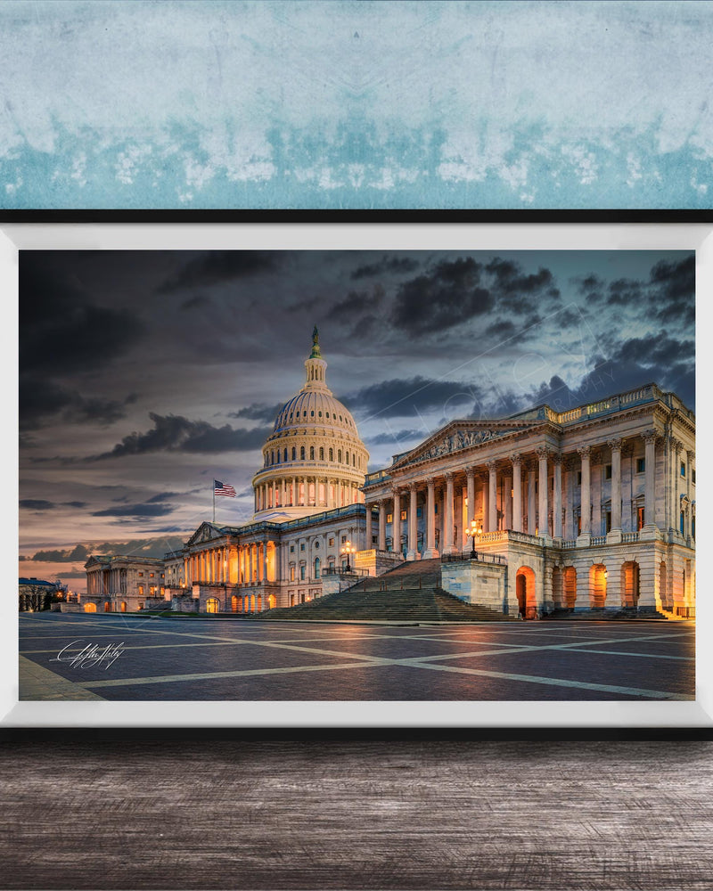 the United States Capitol building in Washington D.C., with its iconic dome and columns illuminated against a dramatic sky.