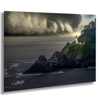 a lighthouse standing on a rocky cliff overlooking the ocean, with a stormy sky in the background.