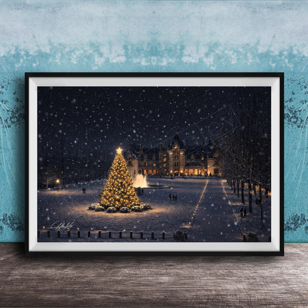 A large, illuminated Christmas tree stands in the center of a snowy park, surrounded by people walking around and enjoying the festive atmosphere.