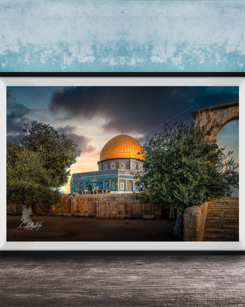 a large, ornate dome with a golden roof, surrounded by trees and a stone wall, set against a dramatic sky with clouds.