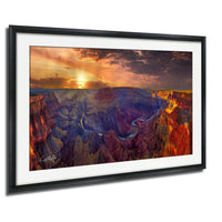 The image is a framed photograph of the Grand Canyon, showcasing the stunning natural landscape with vibrant colors and dramatic rock formations.