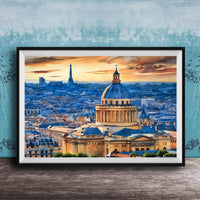 a cityscape with a large domed building in the center, surrounded by a variety of other buildings and structures. The sky above the city is filled with clouds, creating a dramatic backdrop for the scene. The overall composition of the image is visually striking and captures the essence of the city's architectural diversity.