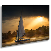 felucca sailboat art, nile river sunset print, luxor egypt fine art, egypt river photography, luxury travel wall art, serene river landscape, egyptian culture artwork, nile boat photography, sunset fine art print, timeless travel decor, historic river wall art, luxury collector photography, egypt fine art print, calming interior artwork