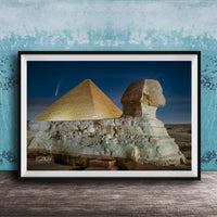 the Great Pyramid of Giza and the Sphinx in Egypt, with the pyramids illuminated against a starry night sky.