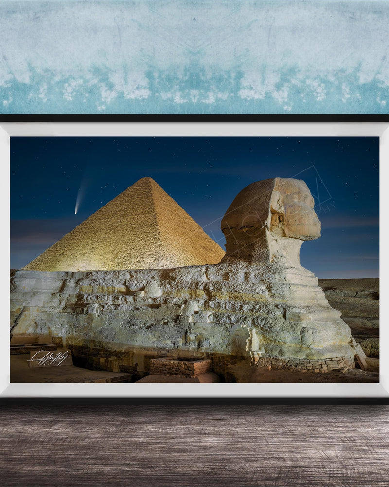 the Great Pyramid of Giza and the Sphinx in Egypt, with the pyramids illuminated against a starry night sky.