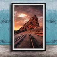 a large, steep rock formation with a dramatic sky in the background, creating a striking and visually appealing scene.