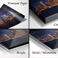 The image is a collage of four different views of a city skyline at night, showcasing the city's lights and architecture.
