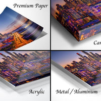 The image is a collage of four different views of a cityscape at night, showcasing the city's skyline and lights.