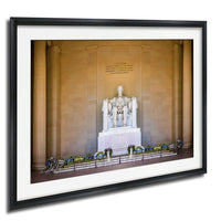 This fine art photograph captures the Lincoln Memorial in Washington DC during the quiet beauty of sunrise. The iconic marble statue of Abraham Lincoln sits beneath the powerful inscription honoring the president who preserved the Union. With soft morning light illuminating the historic monument and ceremonial wreaths placed along the base, this image celebrates one of America’s most meaningful landmarks. Perfect for collectors of Washington DC photography, presidential history artwork