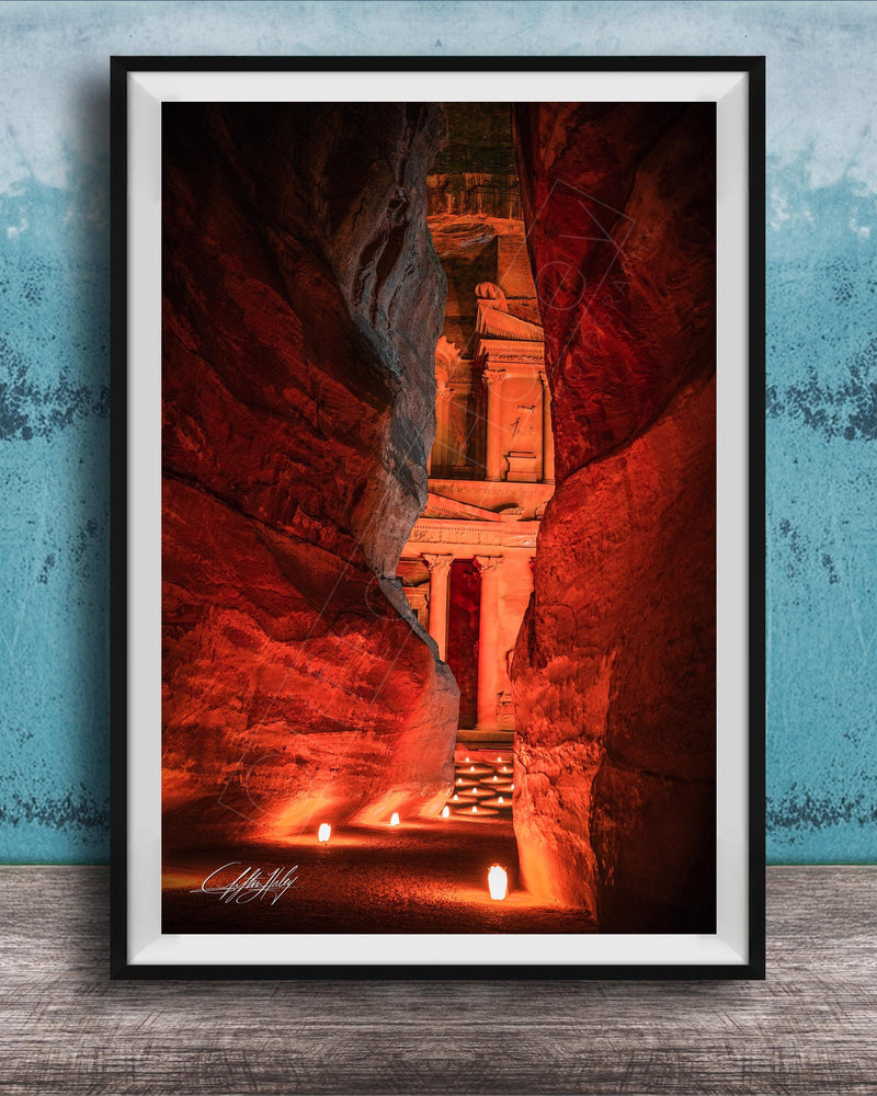 a narrow passage in a cave, with a stone archway leading to a doorway at the end. The passage is illuminated by a warm glow, creating a sense of depth and mystery.