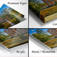 The image is a collage of four photos depicting a brick building surrounded by trees, with the text "Premium Paper", "Canvas Wrap", "Acrylic", and "Metal/Aluminum" indicating the materials used for the prints.