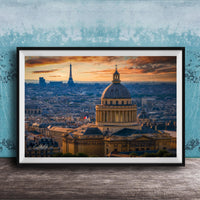 a cityscape with a large domed building in the foreground, surrounded by other buildings and a skyline in the background, with the Eiffel Tower visible in the distance.