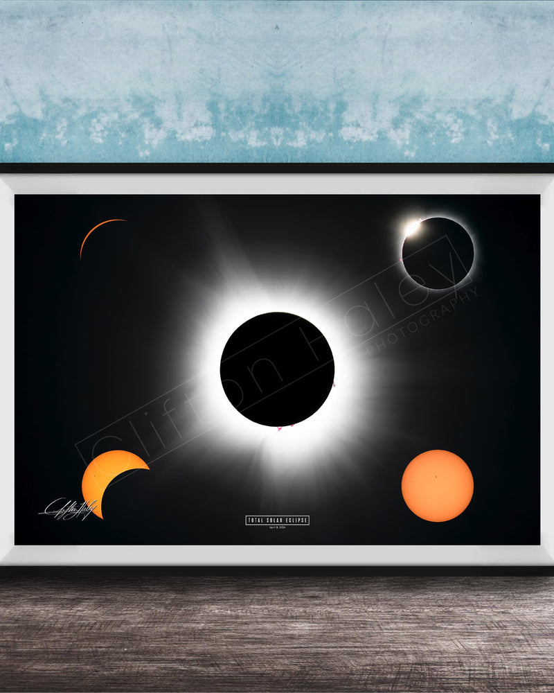 The image is a framed poster depicting a solar eclipse, with the moon partially obscuring the sun and the sun appearing as a bright white orb against the dark background.