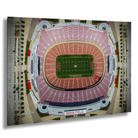 The image is an aerial view of a football stadium, specifically Kansas City Chiefs Stadium, with the football field prominently displayed in the center.
