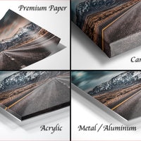 The image is a collage of four different images, each depicting a road or highway with mountains in the background. The images are labeled as "Premium Paper", "Canvas Wrap", "Acrylic", and "Metal/Aluminum".
