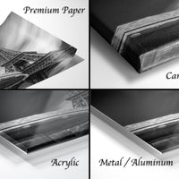 The image is a collage of four different photographs depicting the Eiffel Tower, with each photograph labeled with the appropriate material used to print it: "Premium Paper", "Canvas Wrap", "Acrylic", and "Metal/Aluminum".