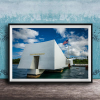 the memorial at Pearl Harbor, Hawaii, with the American flag flying in the background.