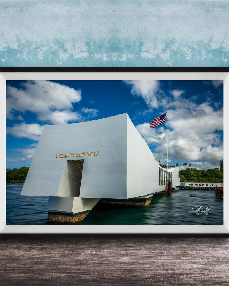 the memorial at Pearl Harbor, Hawaii, with the American flag flying in the background.