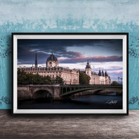 a picturesque scene of a historic building with a dome and a bridge spanning a river, set against a dramatic sky with clouds.