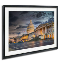 the United States Capitol building in Washington D.C., with its iconic dome and columns illuminated at night against a dramatic cloudy sky.