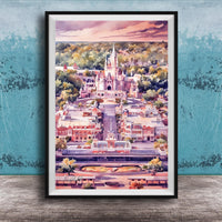 A framed painting depicting a colorful and whimsical cityscape with a castle-like structure in the background, set against a vibrant sky.