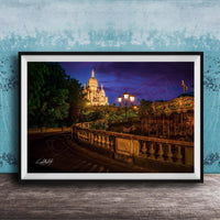 a picturesque night scene featuring a large, illuminated cathedral or church in the background, with a winding path leading up to it. The cathedral is surrounded by trees and illuminated by warm lighting, creating a serene and peaceful atmosphere.