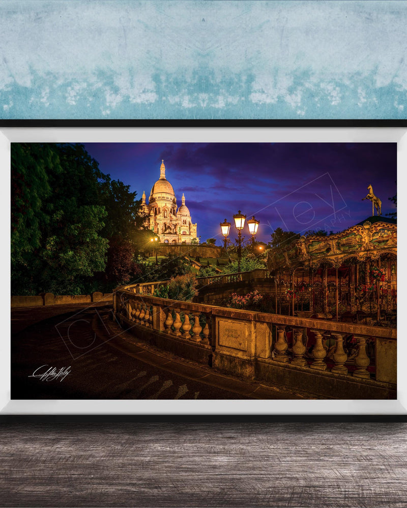 a picturesque night scene featuring a large, illuminated cathedral or church in the background, with a winding path leading up to it. The cathedral is surrounded by trees and illuminated by warm lighting, creating a serene and peaceful atmosphere.