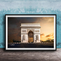 a large, ornate archway with intricate carvings and statues, set against a dramatic sky with clouds and warm colors.