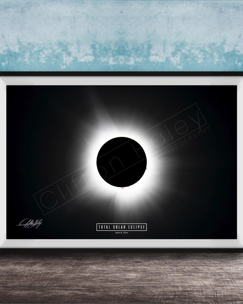 The image is a framed poster depicting a total solar eclipse, with a black background and a bright white solar disk in the center.