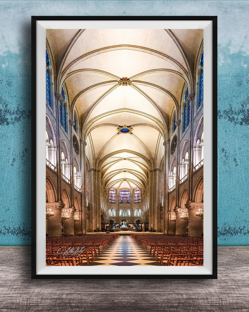 a grand cathedral with a high vaulted ceiling, ornate architectural details, and rows of wooden pews leading to the altar.