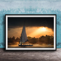 felucca sailboat art, nile river sunset print, luxor egypt fine art, egypt river photography, luxury travel wall art, serene river landscape, egyptian culture artwork, nile boat photography, sunset fine art print, timeless travel decor, historic river wall art, luxury collector photography, egypt fine art print, calming interior artwork