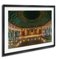 a grand, ornate interior space with a domed ceiling and intricate architectural details.