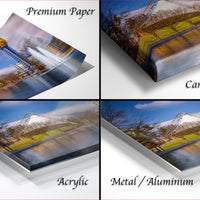 The image is a collage of four photos depicting a scenic landscape with a lake, trees, and a tower. The photos are labeled as "Premium Paper", "Canvas Wrap", "Acrylic", and "Metal/Aluminum".