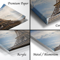 The image is a collage of four different views of the Eiffel Tower, with each view labeled as either "Premium Paper", "Canvas Wrap", "Acrylic", or "Metal/Aluminum".