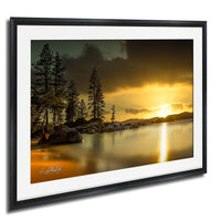 a serene landscape with a lake, trees, and a sunset over the horizon.