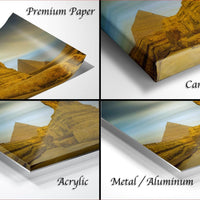 The image is a collage of four different views of a desert landscape, including a close-up of a sand dune and a pyramid.